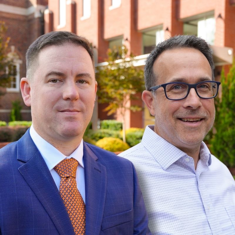 Engineering Director Jonathan Ham with Assistant Engineering Director in front of town hall
